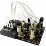 Image of Labsmith's flow controller kit, assembled onto a breadboard